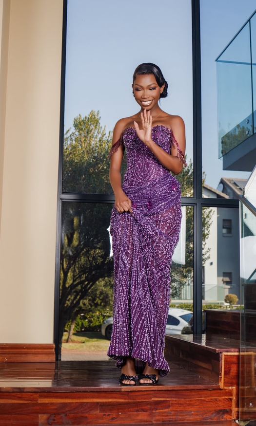 Purple Lavina — Amethyst beadwork in a fitted column, photographed on a balcony above the valley.
