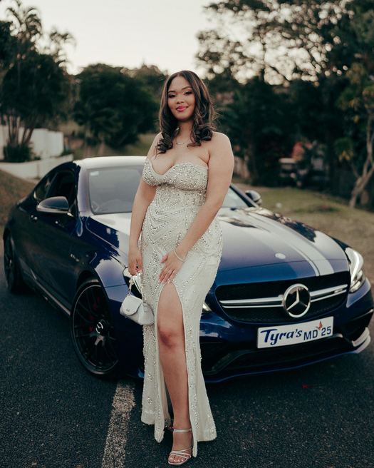 Sagittarius — Ivory crystal cut to a fishtail — a matric-dance arrival, shot beside the car.